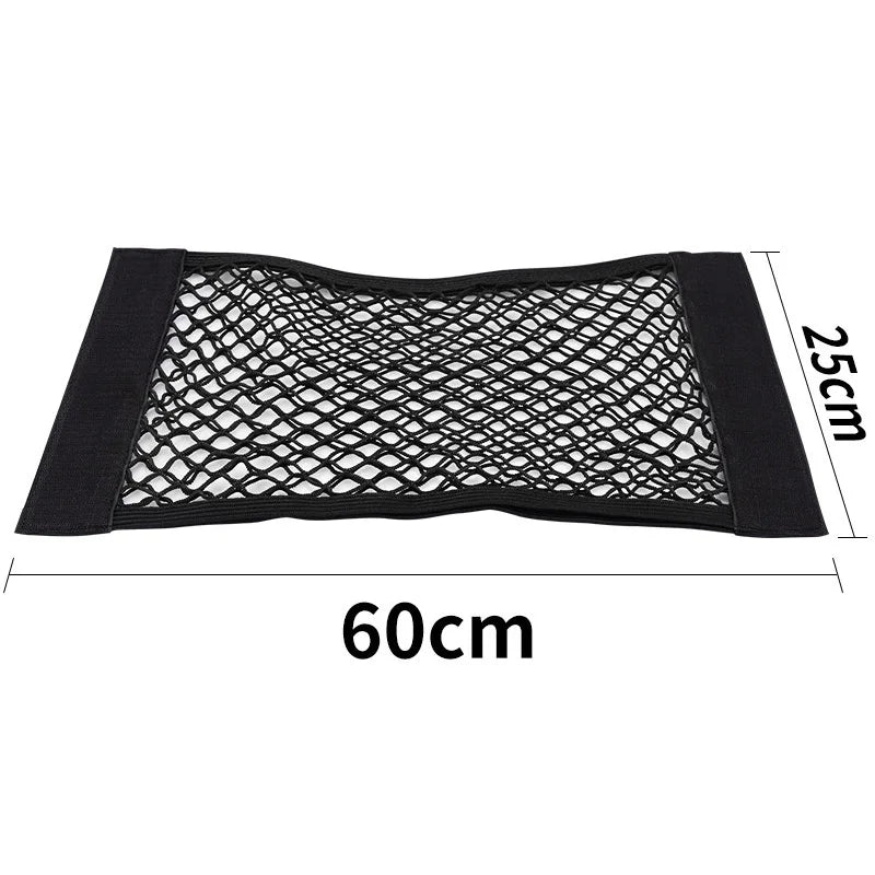 Trunk organizer made of mesh, netting, and pockets.